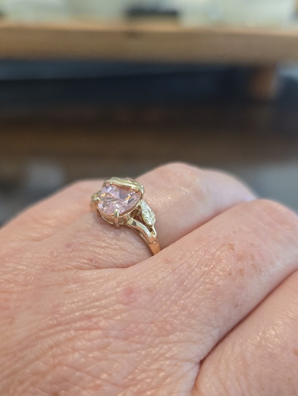 Gold Ring with Pink Gemstone and Leaf Accent - Picture 4 of 5